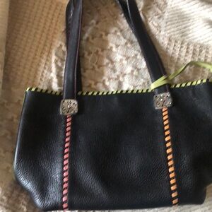 Brighton handbag with one exterior pocket three interior pockets